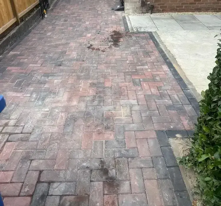 Block paved side path beside a semi