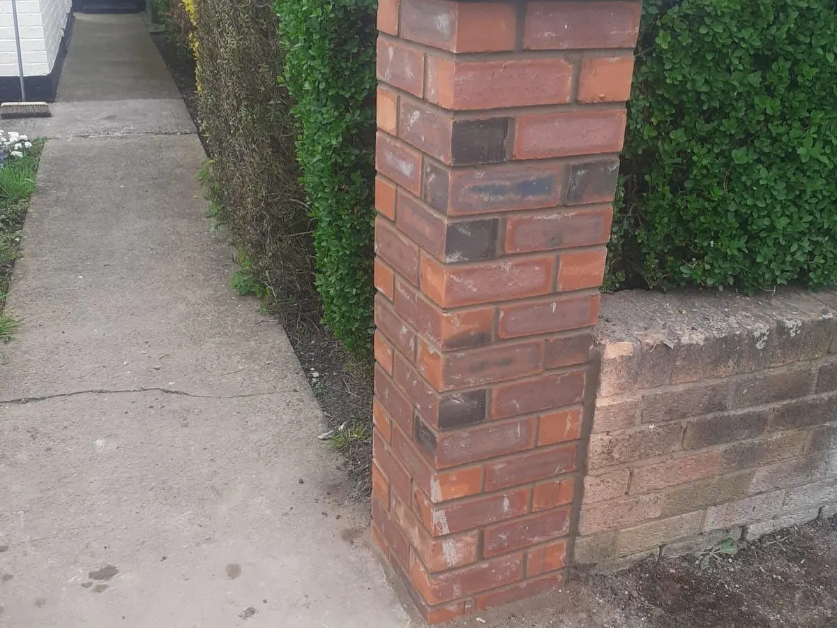 New red brick gate pier with a stone cap in Manchester