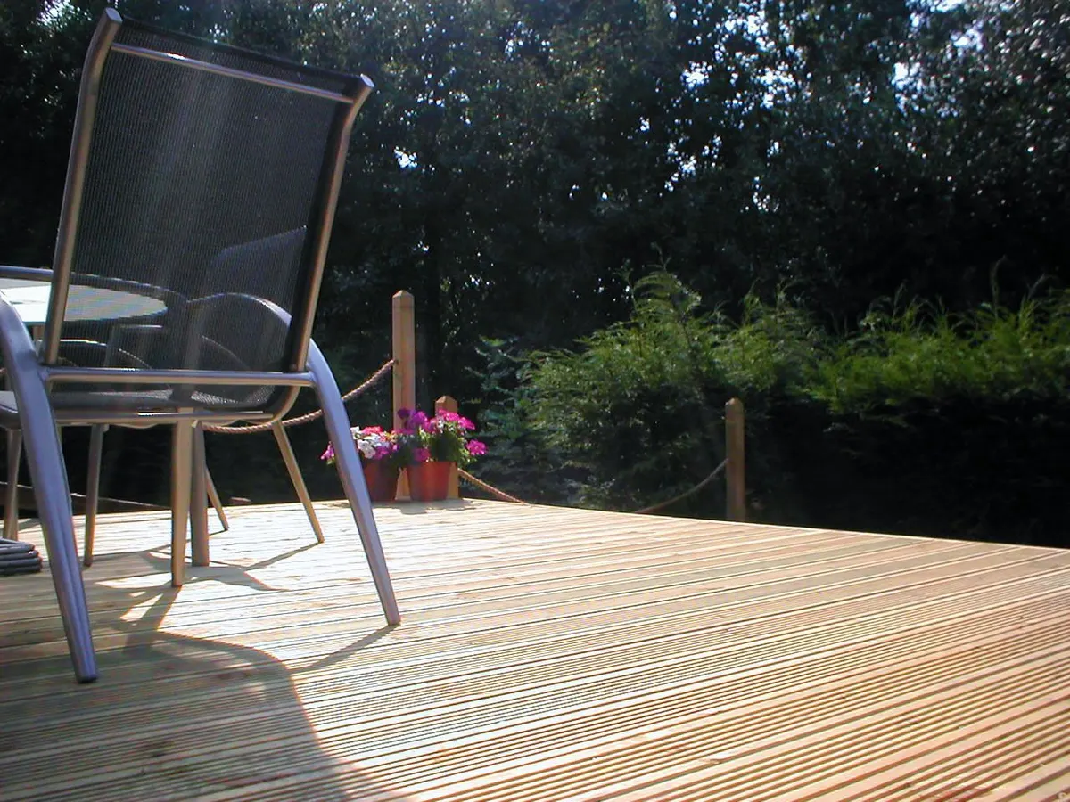 New softwood deck with garden chairs